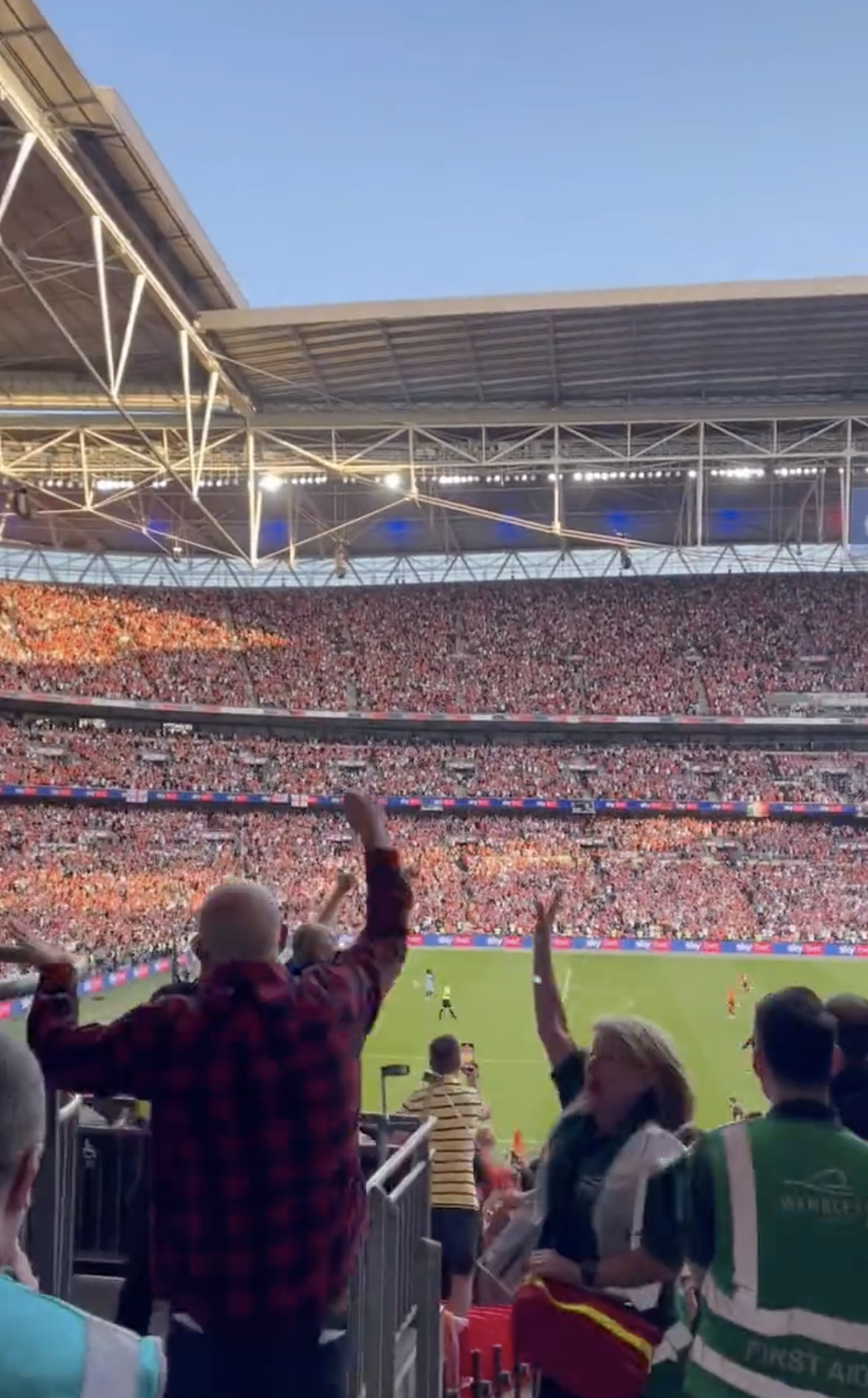 Fans celebrate inside a stadium